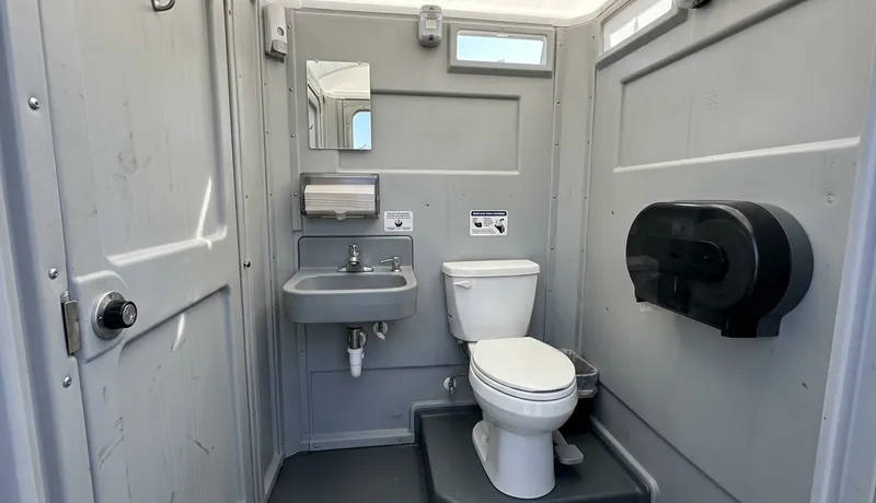 Deluxe Porta Potty (with Flushing) event setup in Tulsa, OK